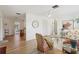 Bright living room featuring hardwood flooring, an overhead fan, and lots of natural light at 1656 Brentlawn St, Deltona, FL 32725