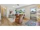 Bright living room with lots of natural light, modern flooring and stylish furniture at 1656 Brentlawn St, Deltona, FL 32725