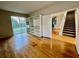 Bedroom with hardwood floors, custom shelving, and a sliding glass door to the backyard at 1831 Abbots Hill Dr, Orlando, FL 32835