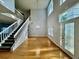 Bright foyer features hardwood floors, high ceilings, and a grand staircase at 1831 Abbots Hill Dr, Orlando, FL 32835