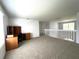 Spacious living room with carpet flooring, offering ample space for relaxation and entertaining at 1831 Abbots Hill Dr, Orlando, FL 32835