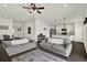 Bright and open-concept design of the kitchen and living room creates an inviting space for modern living and entertaining at 1963 Thompson Preserve Blvd, Bartow, FL 33830