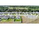 Picture of a street filled with beautiful homes with manicured lawns showcasing a peaceful and friendly neighborhood at 1963 Thompson Preserve Blvd, Bartow, FL 33830