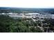 Aerial shot showcasing the home's proximity to local shopping centers, highways and natural green surroundings at 2132 Rouse Lake Rd, Orlando, FL 32817