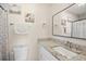 Bathroom featuring granite countertops, a modern sink, and a stylish mirror at 2132 Rouse Lake Rd, Orlando, FL 32817