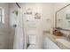 Well-lit bathroom featuring a marble shower, granite countertops, a modern sink, and stylish accents at 2132 Rouse Lake Rd, Orlando, FL 32817