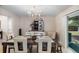 Dining room with seating for six with view of backyard at 2132 Rouse Lake Rd, Orlando, FL 32817