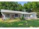 Charming single-story home with lush landscaping at 2132 Rouse Lake Rd, Orlando, FL 32817