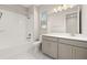 Bright bathroom with a shower-tub combination and vanity at 236 Pink Ibis Bnd, St Cloud, FL 34772