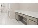 Hallway desk featuring white quartz countertop and gold hardware at 236 Pink Ibis Bnd, St Cloud, FL 34772