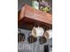 A coffee bar featuring chalkboard wall, mugs, decorative shelf, and coffee-themed decor offers a charming touch at 2454 Dream Home Ct, St Cloud, FL 34772
