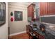 A cozy home office featuring custom cabinetry, stylish decor, and a dedicated workspace for productivity at 2454 Dream Home Ct, St Cloud, FL 34772