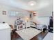 Bright bedroom with playful decor and hardwood floors at 2817 Prince John Rd, Winter Park, FL 32792