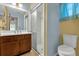 Bathroom featuring a shower, and sink with vanity at 3218 Cimarron Dr, Orlando, FL 32829