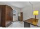 This bedroom features a window, a desk, and an armoire at 3218 Cimarron Dr, Orlando, FL 32829