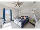 bedroom with blue accents, a ceiling fan and lots of toys at 3417 Michigan St, Lake Mary, FL 32746