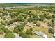 Expansive aerial view of property with mature trees and open land at 3975 Rambler Ave, St Cloud, FL 34772