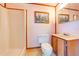 Bathroom with a small shower and toilet, along with a sink and vanity at 3975 Rambler Ave, St Cloud, FL 34772