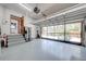 Spacious garage with open door, stairs to entryway and utility appliances at 3975 Rambler Ave, St Cloud, FL 34772