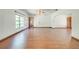 Large living room with hardwood floors and open layout at 3975 Rambler Ave, St Cloud, FL 34772