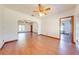 Bright living room with hardwood floors and open doorway at 3975 Rambler Ave, St Cloud, FL 34772