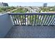 Balcony with white railings and tile floor overlooking the cityscape at 400 E Colonial Dr # 1003, Orlando, FL 32803