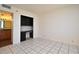 Bright bedroom featuring tile flooring and a built-in desk and cabinet space at 400 E Colonial Dr # 1003, Orlando, FL 32803