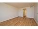 Bright living room featuring wood-look flooring and neutral walls at 400 E Colonial Dr # 1003, Orlando, FL 32803