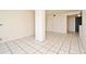 A spacious living area with tiled floors and neutral wall colors at 400 E Colonial Dr # 1003, Orlando, FL 32803