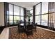 Lobby area with seating and large windows offering exterior views at 400 E Colonial Dr # 1003, Orlando, FL 32803