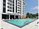 Exterior view of the building and pool area at 400 E Colonial Dr # 1003, Orlando, FL 32803