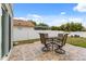 This backyard patio features a lovely stone pattern, and outdoor seating providing an ideal space for relaxation at 429 Rona Ln, Davenport, FL 33897