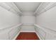 Walk-in closet with shelving, and hardwood floors at 429 Rona Ln, Davenport, FL 33897
