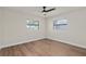 Bedroom with two windows providing lots of natural light at 5326 Weirwood Ave, Orlando, FL 32810