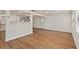 Bright, open-concept living space with modern flooring and ample natural light at 5326 Weirwood Ave, Orlando, FL 32810
