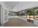 The screened-in patio offers an outdoor space for dining and relaxation at 5326 Weirwood Ave, Orlando, FL 32810