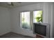 Modest bedroom with a large window that provides bright, natural lighting at 5502 Minaret Ct, Orlando, FL 32821