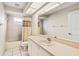 Clean bathroom with a shower and tub combination and large mirror at 58 Golf View Dr, Ocala, FL 34472