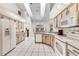 Spacious kitchen with ample cabinet space and white appliances at 58 Golf View Dr, Ocala, FL 34472