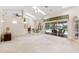 Bright, open living area with a ceiling fan, recessed lighting, and sliding doors at 58 Golf View Dr, Ocala, FL 34472