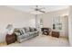 Inviting living room with large windows and comfortable seating at 58 Golf View Dr, Ocala, FL 34472