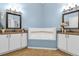 Stylish bathroom with separate vanities, ample counter space and a luxurious tub for relaxation at 6147 Sunnyvale Dr # Ge, Orlando, FL 32822