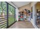 Enclosed patio offering a relaxed atmosphere with views of the outdoors and ample shelving space at 6147 Sunnyvale Dr # Ge, Orlando, FL 32822