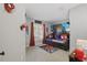 Fun bedroom designed with colorful Spiderman theme, featuring custom murals and themed accents at 634 Chadbury Way, Kissimmee, FL 34744