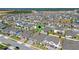 Aerial view showing location within a neighborhood with well-maintained homes and landscaping at 690 Blue Citrus Ln, Minneola, FL 34715