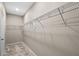 This walk-in closet has wire shelving, maximizing space and promoting organization at 690 Blue Citrus Ln, Minneola, FL 34715