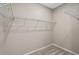 Walk-in closet offers abundant storage and organization with wire shelving at 690 Blue Citrus Ln, Minneola, FL 34715