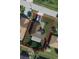 Aerial view of the property highlighting the home, driveway, and backyard at 712 Leonardo Ct, Kissimmee, FL 34758