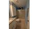 Bathroom features include tile floors, shower with glass door, and a white cabinet at 712 Leonardo Ct, Kissimmee, FL 34758