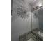 Updated bathroom with dual sinks, granite countertop, and unique light fixture at 712 Leonardo Ct, Kissimmee, FL 34758